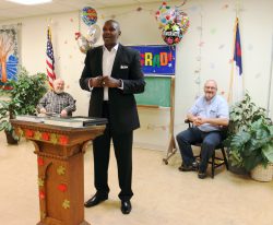 Robert shares his testimony with the men as he graduates from the Mission's New Life Program