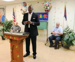 Robert shares his testimony with the men as he graduates from the Mission's New Life Program 