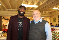 Philadelphia Eagle Malcolm Jenkins with Mission Executive Director Bob Emberger at our Christmas Eve chapel and luncheon